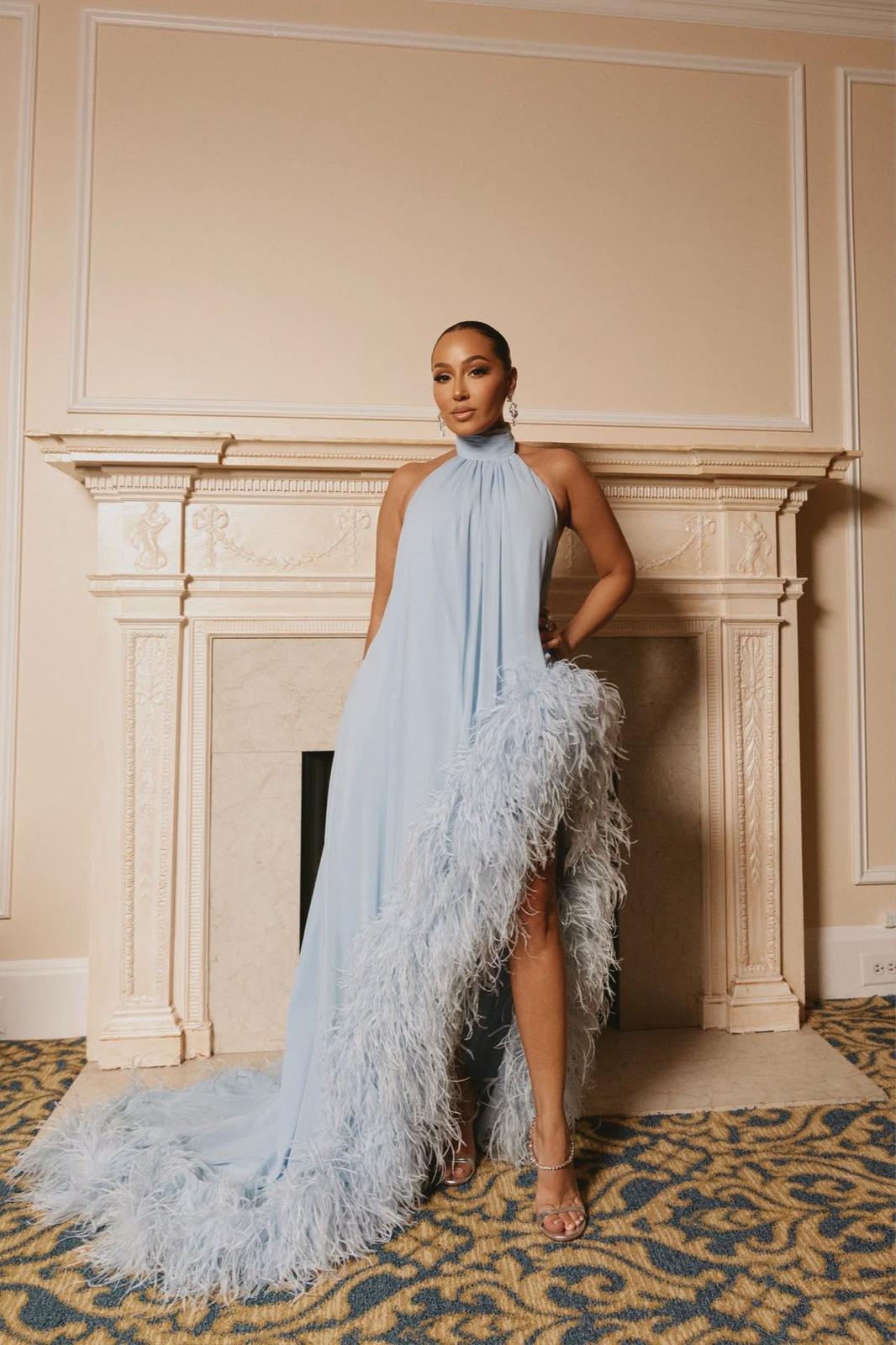 Sky blue halterneck Yawa gown with cascading ostrich feather train by AKUVEE