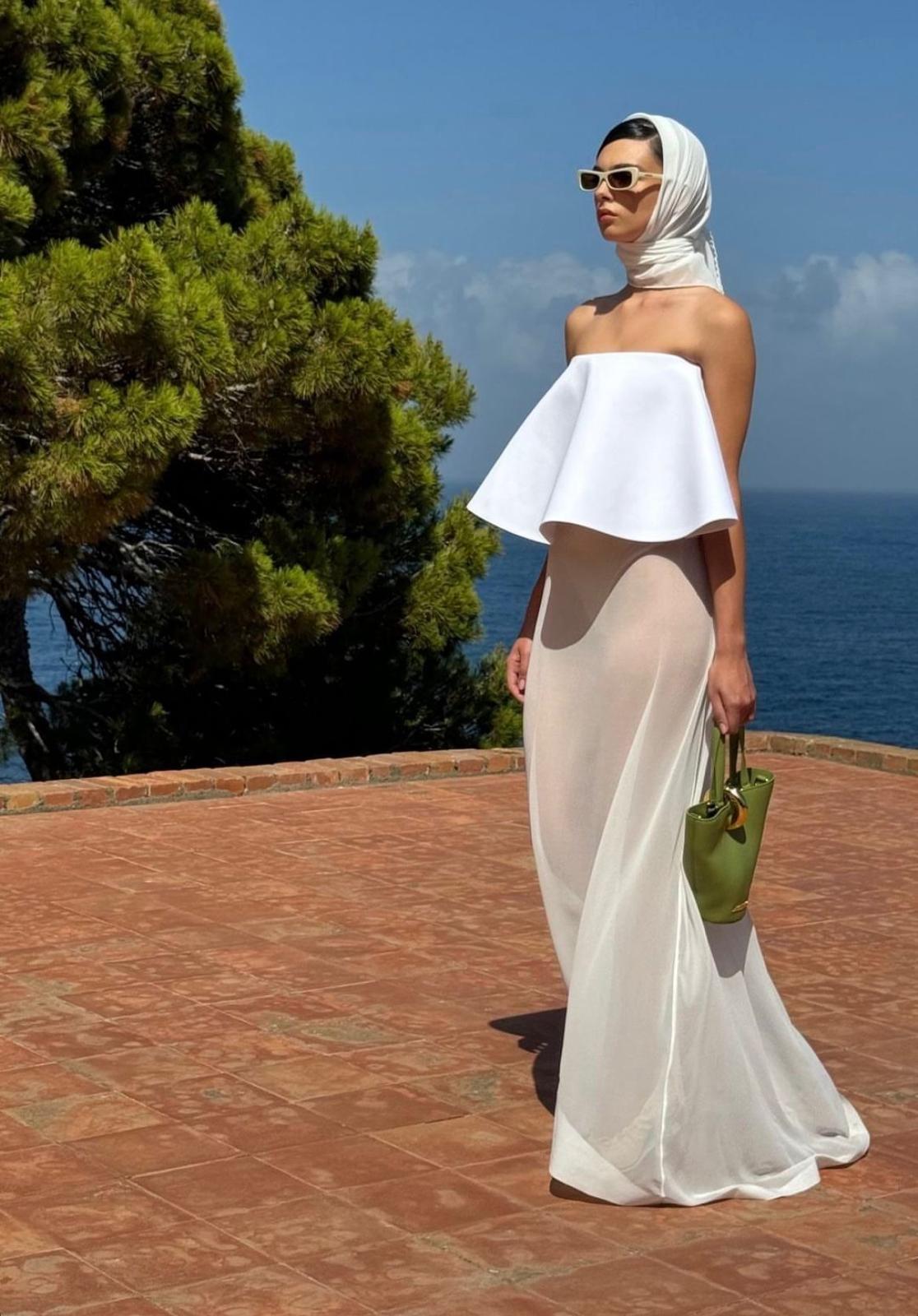 White architectural strapless top with sheer bias maxi skirt and headscarf by AKUVEE